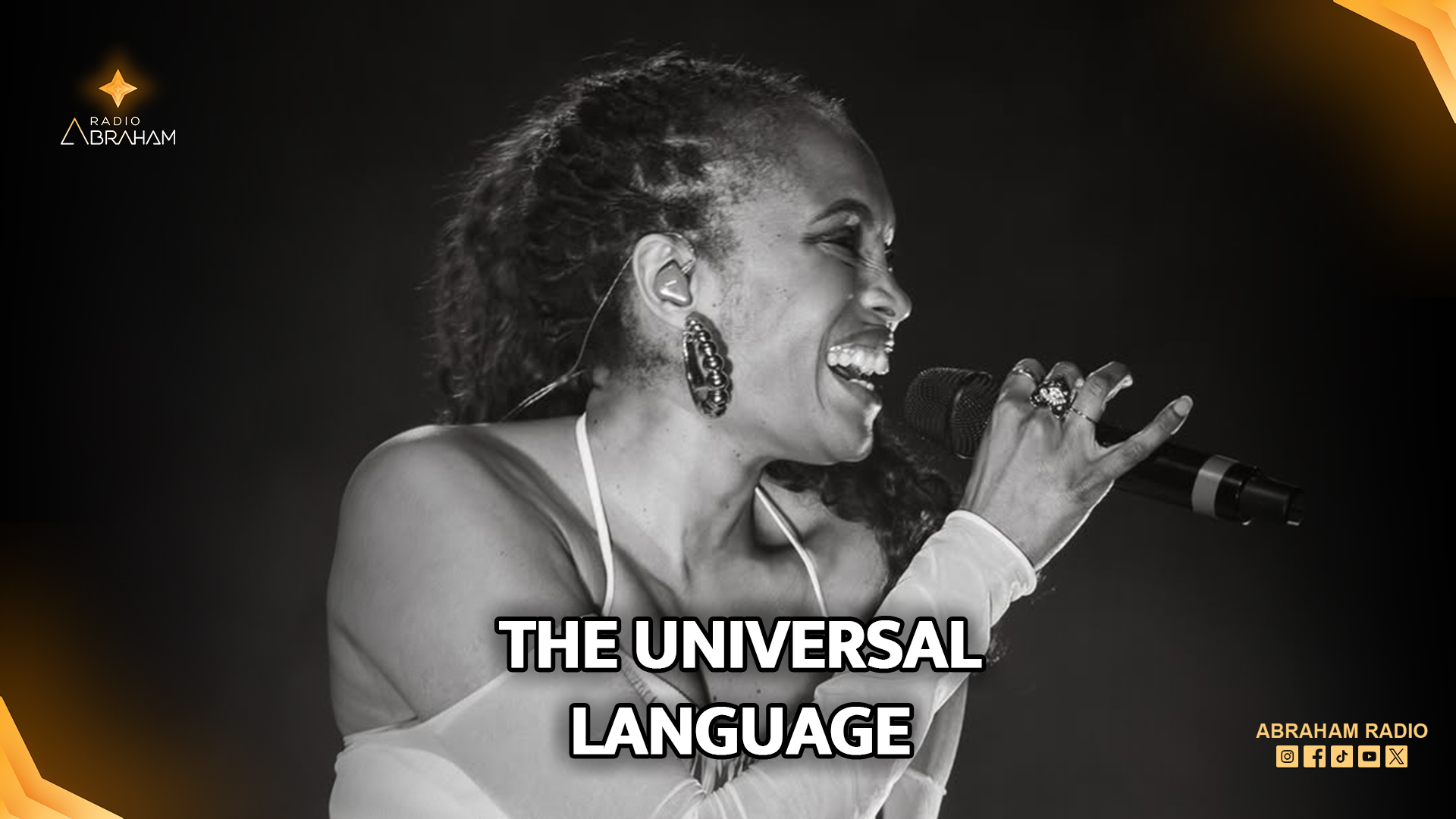 An artist performing live on stage, reflecting on a ten-year journey of music and universal connection.